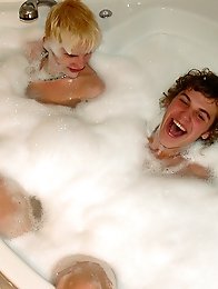 Showering boy duo enjoying wet and nudity