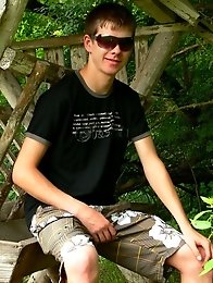 Slim gorgeous boyish Twink outdoor posing