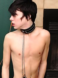 Kyler is chained to a St. Andrews Cross and fucked with a dildo